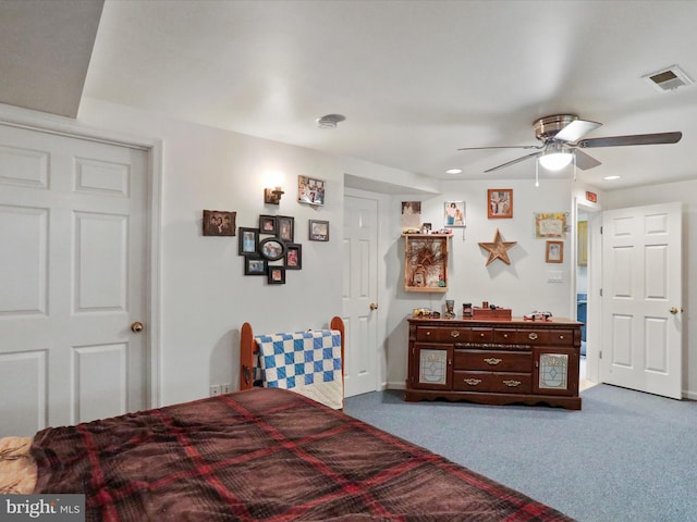 carpeted bedroom featuring ceiling fan