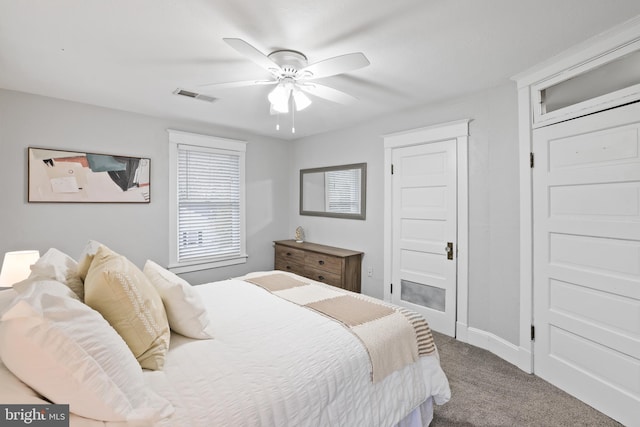 carpeted bedroom featuring ceiling fan