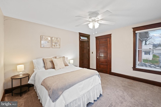 bedroom featuring ceiling fan and carpet floors