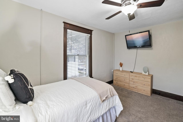 bedroom with ceiling fan and carpet