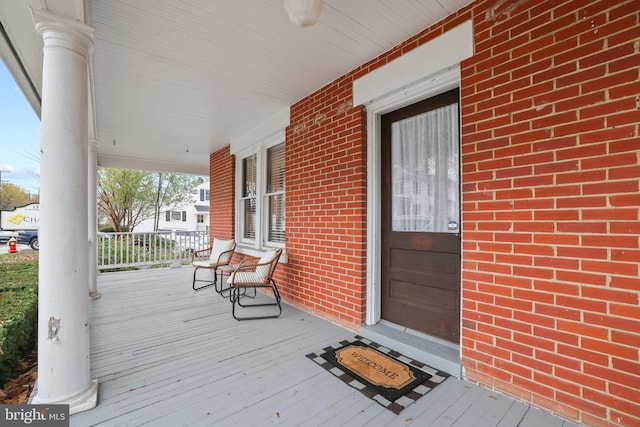 wooden deck with a porch