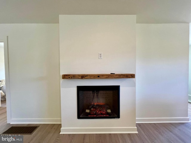 interior details with hardwood / wood-style floors