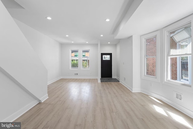 foyer entrance featuring light hardwood / wood-style floors