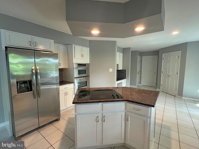 kitchen featuring white cabinetry, light tile patterned flooring, recessed lighting, and appliances with stainless steel finishes