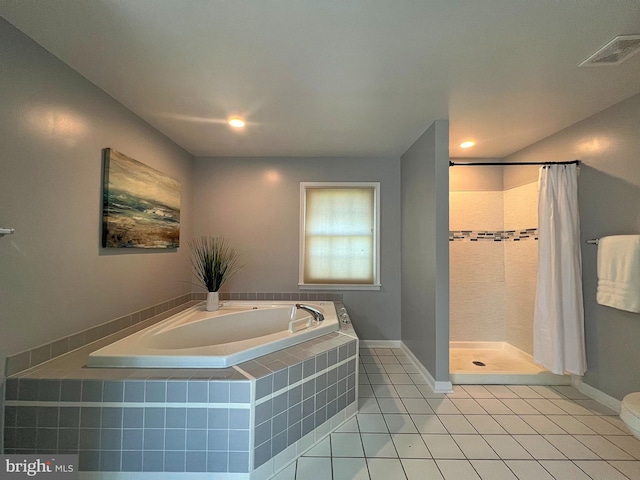 full bathroom with visible vents, a garden tub, a stall shower, tile patterned flooring, and baseboards