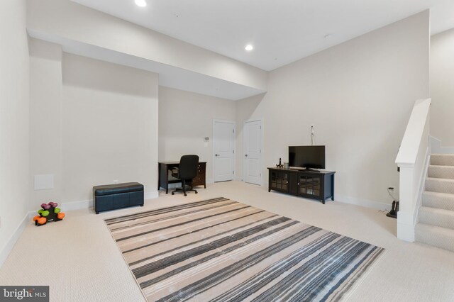 interior space with stairway, recessed lighting, carpet flooring, and baseboards