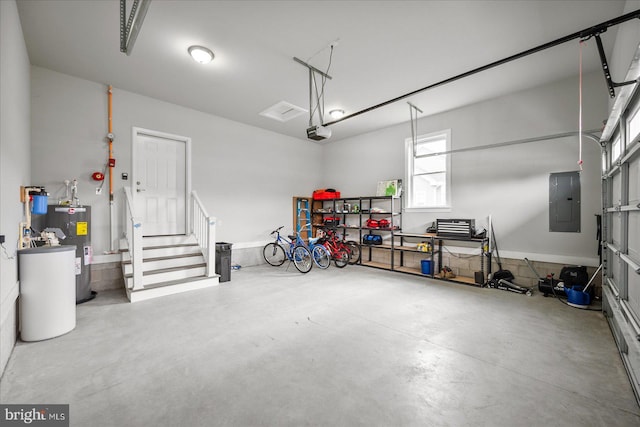 garage with a garage door opener, electric panel, and electric water heater