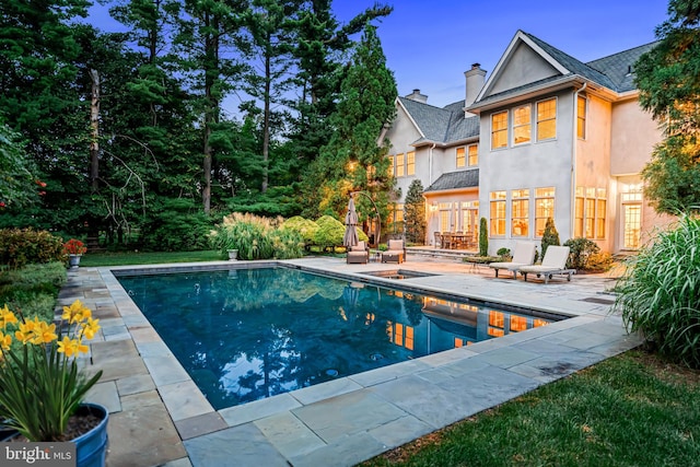 view of pool with a patio area