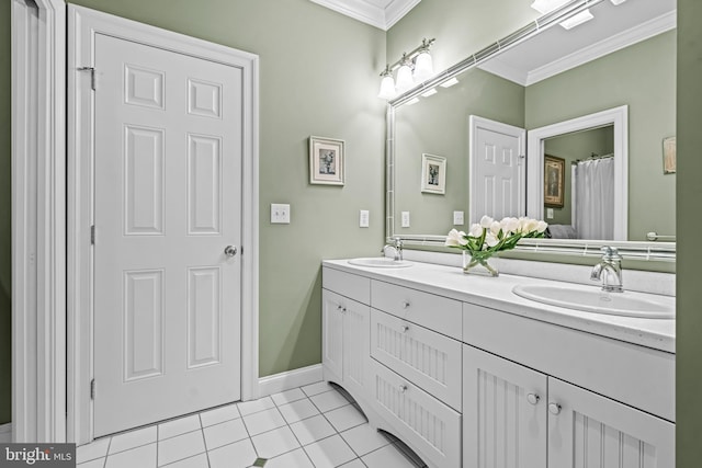 bathroom featuring ornamental molding, tile patterned flooring, and vanity