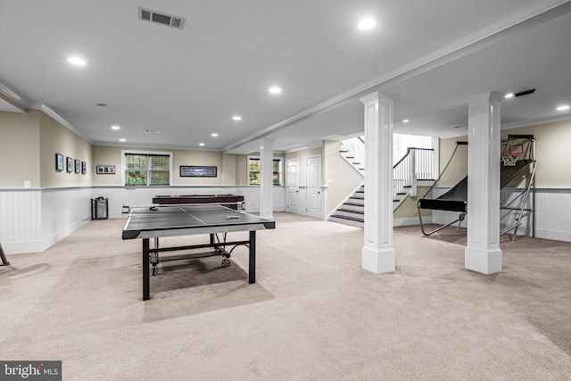 playroom with light carpet and ornamental molding