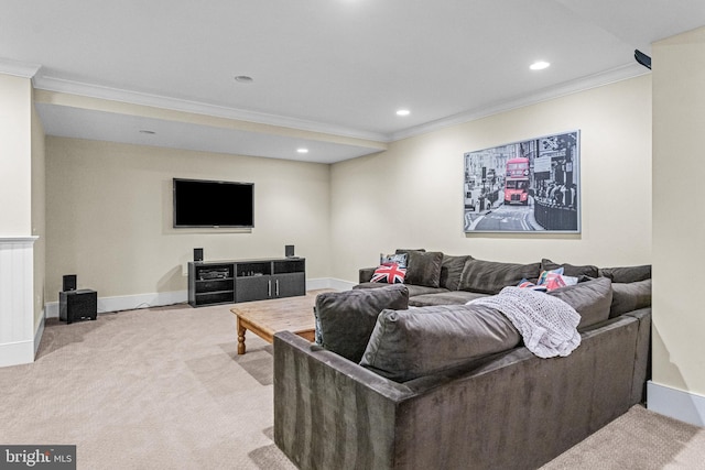 carpeted living room featuring ornamental molding