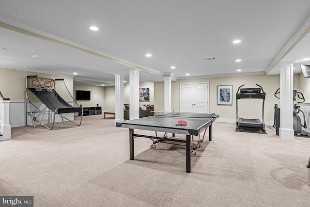 game room with light colored carpet, crown molding, and ornate columns