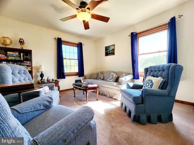 living room with ceiling fan and light carpet