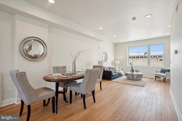 dining room with light hardwood / wood-style floors