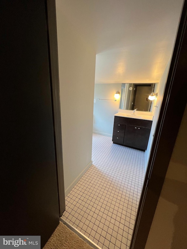 interior space featuring sink and tile patterned floors