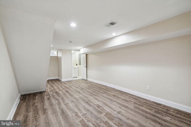 empty room featuring hardwood / wood-style flooring