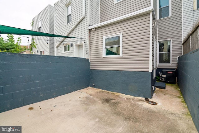 view of patio with central AC unit