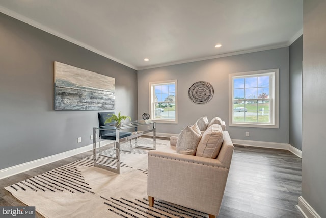 office space featuring recessed lighting, crown molding, baseboards, and wood finished floors