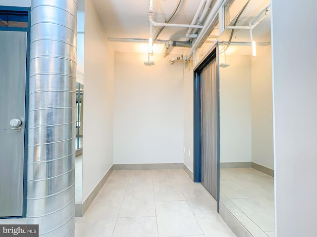 interior space with light tile patterned floors