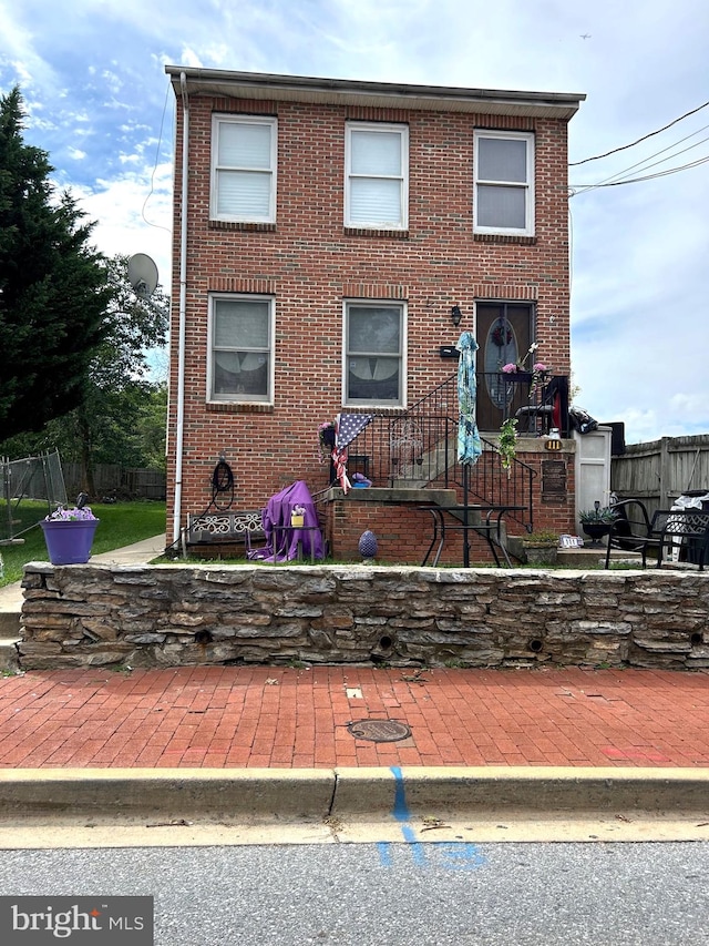 view of front of home with a patio