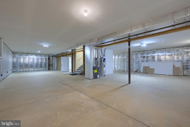 basement with heating unit and water heater