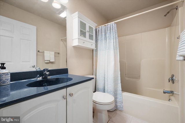 full bathroom with tile patterned floors, shower / bathtub combination with curtain, toilet, and vanity