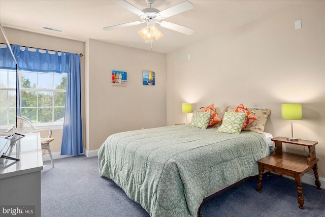 bedroom featuring ceiling fan and carpet flooring