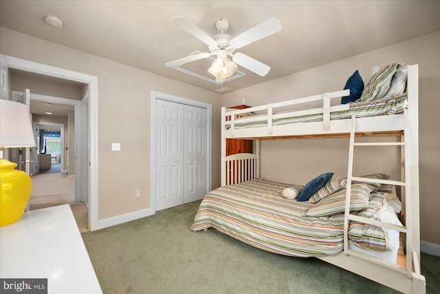 bedroom featuring a closet, ceiling fan, and carpet floors