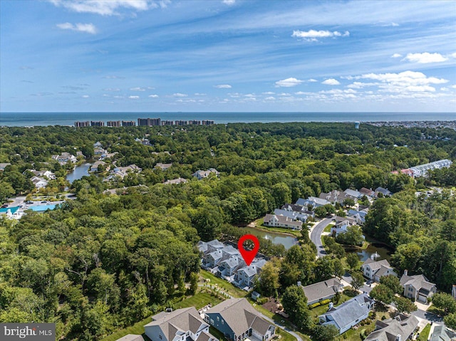 aerial view featuring a residential view and a water view