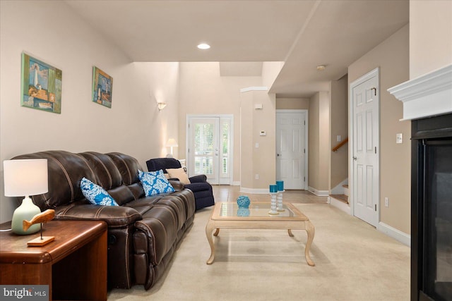 living room featuring light colored carpet