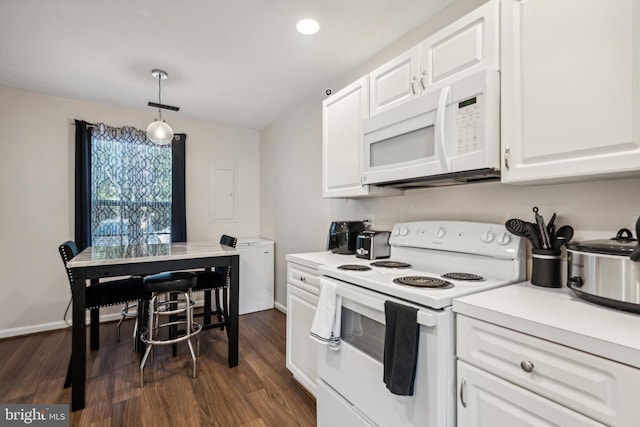 kitchen with white appliances, dark wood-style flooring, baseboards, white cabinets, and light countertops