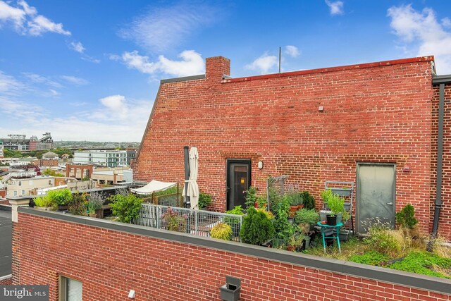 exterior space featuring a balcony