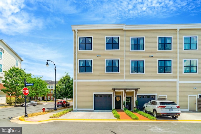 view of building exterior featuring a garage