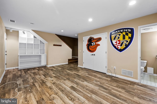 entrance foyer with hardwood / wood-style floors