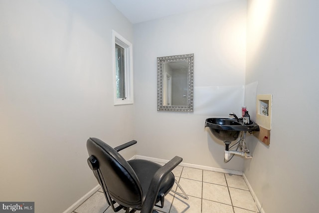 sitting room featuring light tile patterned floors