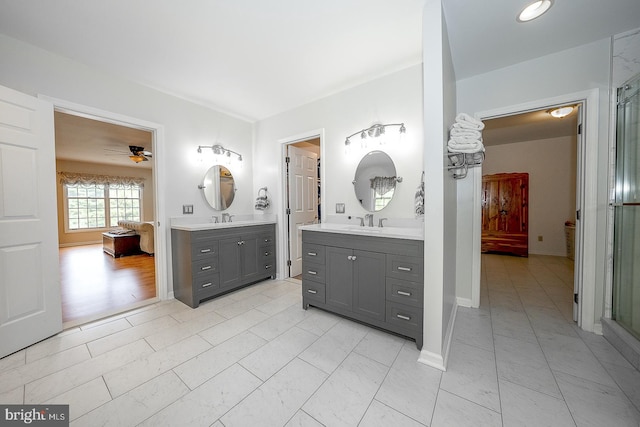 bathroom with vanity and ceiling fan