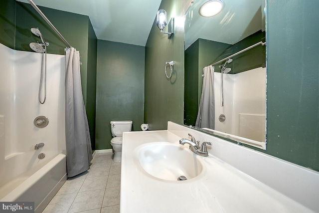 full bathroom featuring vanity, toilet, tile patterned floors, and shower / tub combo with curtain