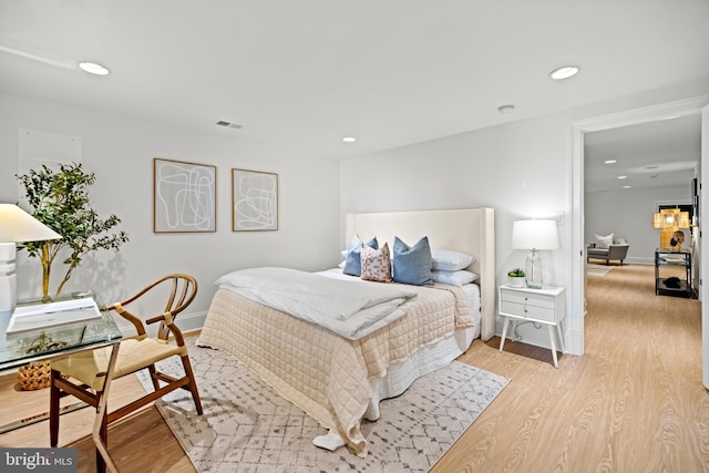 bedroom featuring light hardwood / wood-style flooring