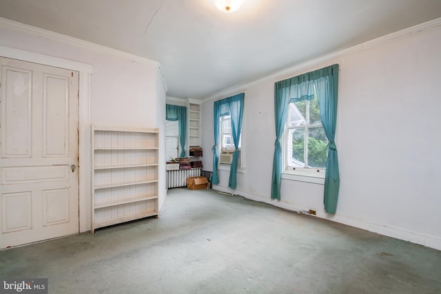 interior space with radiator and crown molding