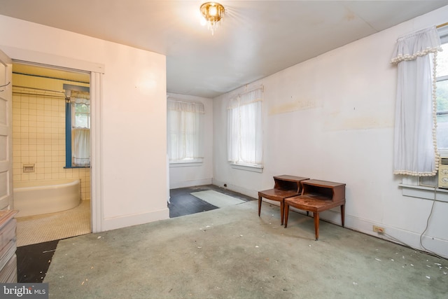 bedroom featuring tile walls