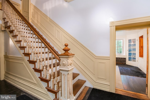 staircase featuring hardwood / wood-style floors