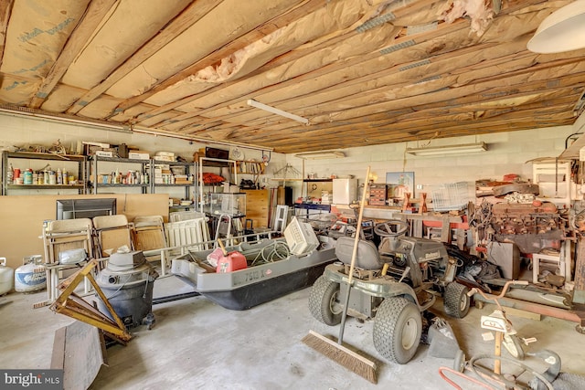 garage with a workshop area