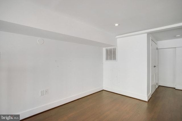 spare room featuring hardwood / wood-style flooring