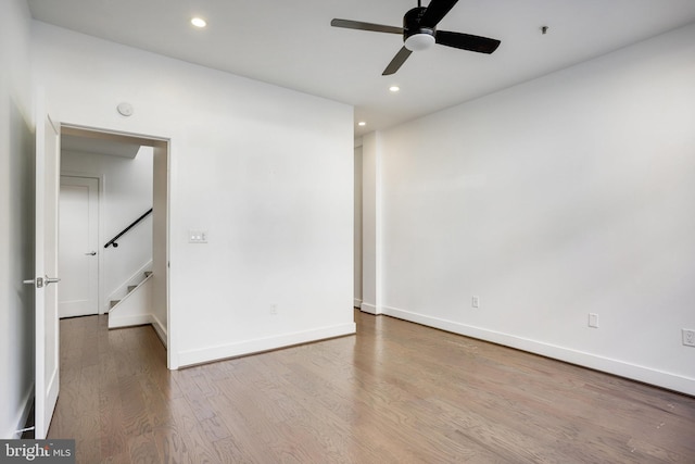 spare room with ceiling fan and light hardwood / wood-style floors