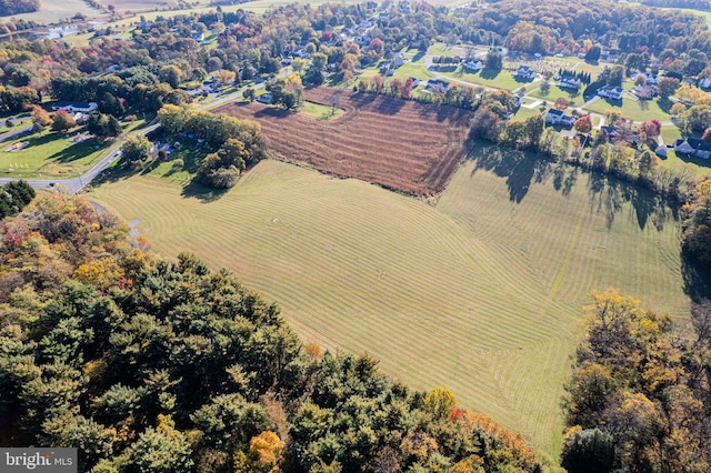 birds eye view of property featuring a rural view