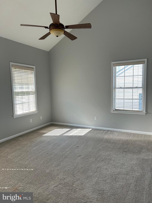 bedroom featuring lofted ceiling, ceiling fan, and carpet flooring