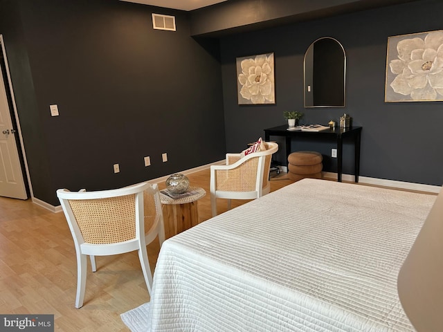 bedroom featuring light hardwood / wood-style floors