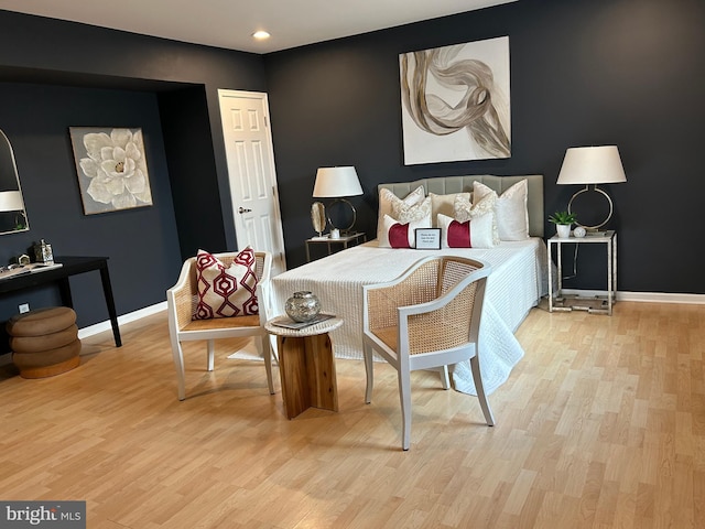 living area with light hardwood / wood-style floors