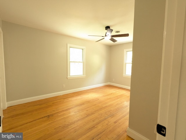 unfurnished room featuring ceiling fan and light hardwood / wood-style floors