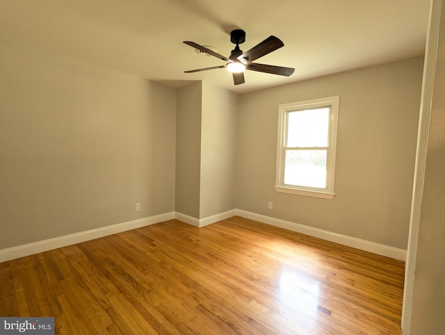 unfurnished room featuring light hardwood / wood-style flooring and ceiling fan